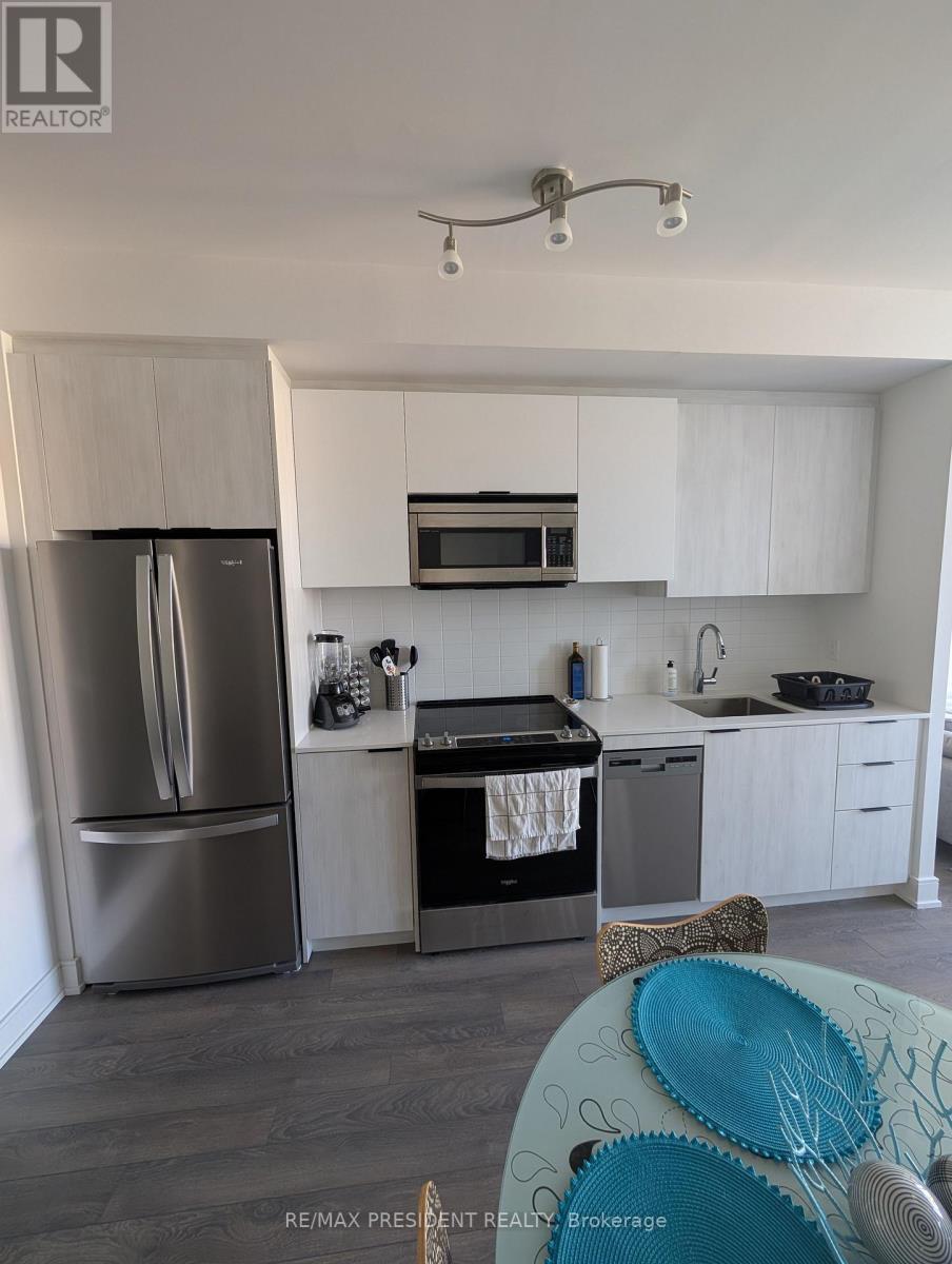 1207 - 1350 Ellesmere Road, Toronto, ON - Indoor Photo Showing Kitchen With Stainless Steel Kitchen