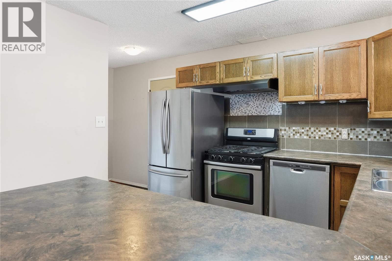 5 Heritage Place, Hepburn, SK - Indoor Photo Showing Kitchen With Double Sink