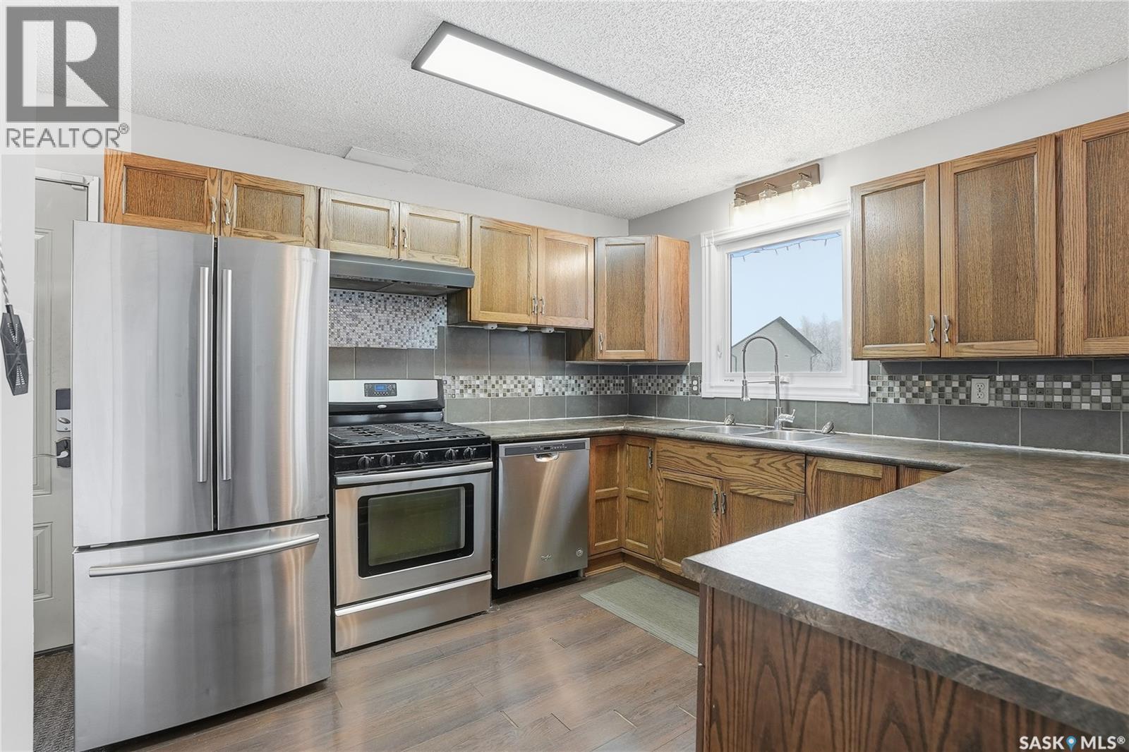 5 Heritage Place, Hepburn, SK - Indoor Photo Showing Kitchen With Double Sink
