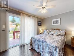 master bedroom with walk-out to deck -