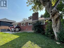 walk-out to deck and patio & private yard -