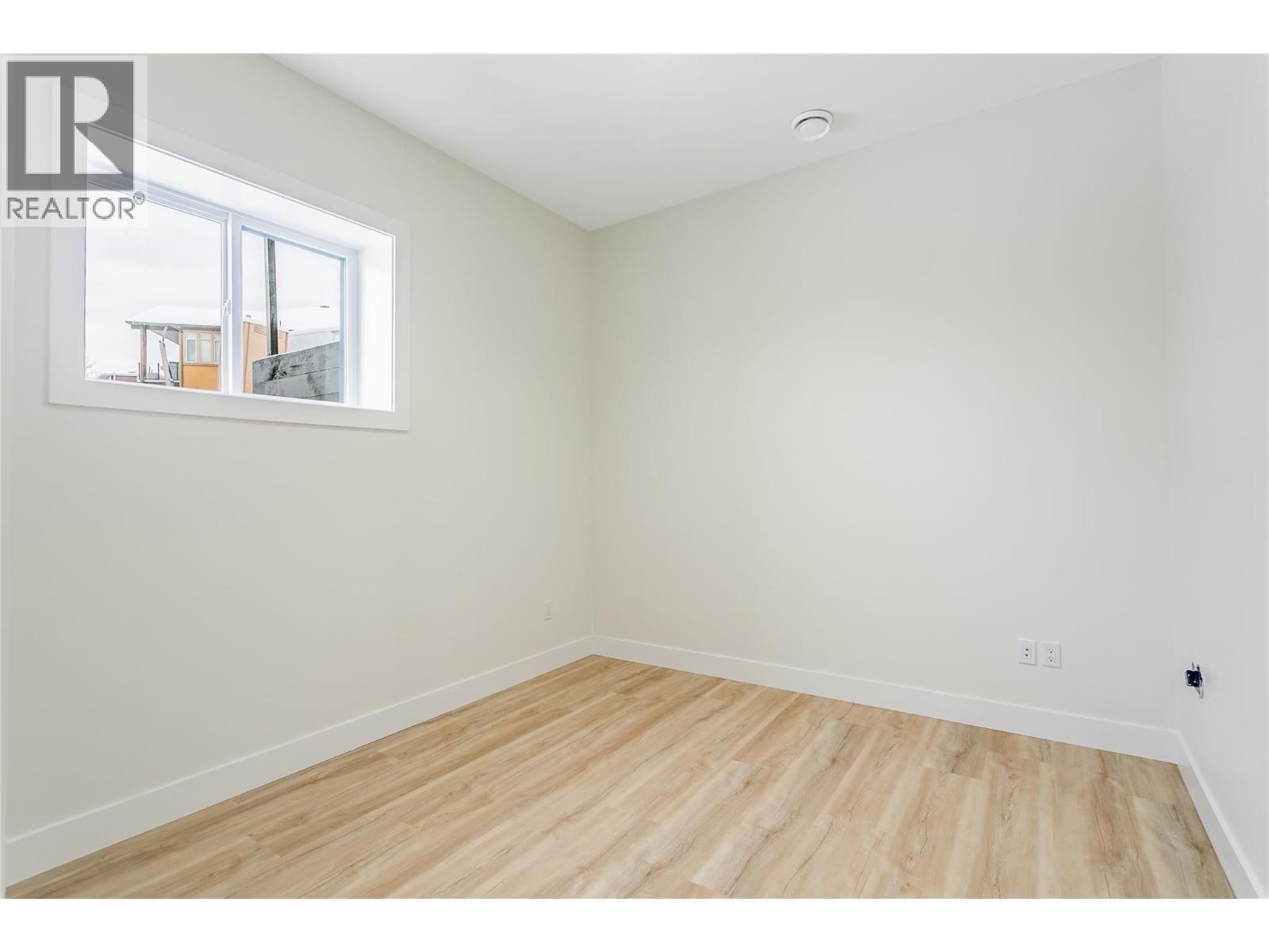 Lower Level Media/ Family Room - 1136 Hume Avenue, Kelowna, BC - Indoor Photo Showing Other Room