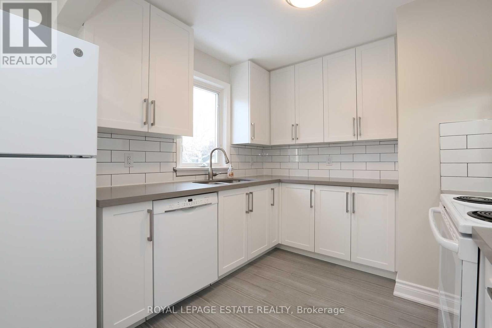 215 Oakridge Drive, Toronto, ON - Indoor Photo Showing Kitchen With Double Sink