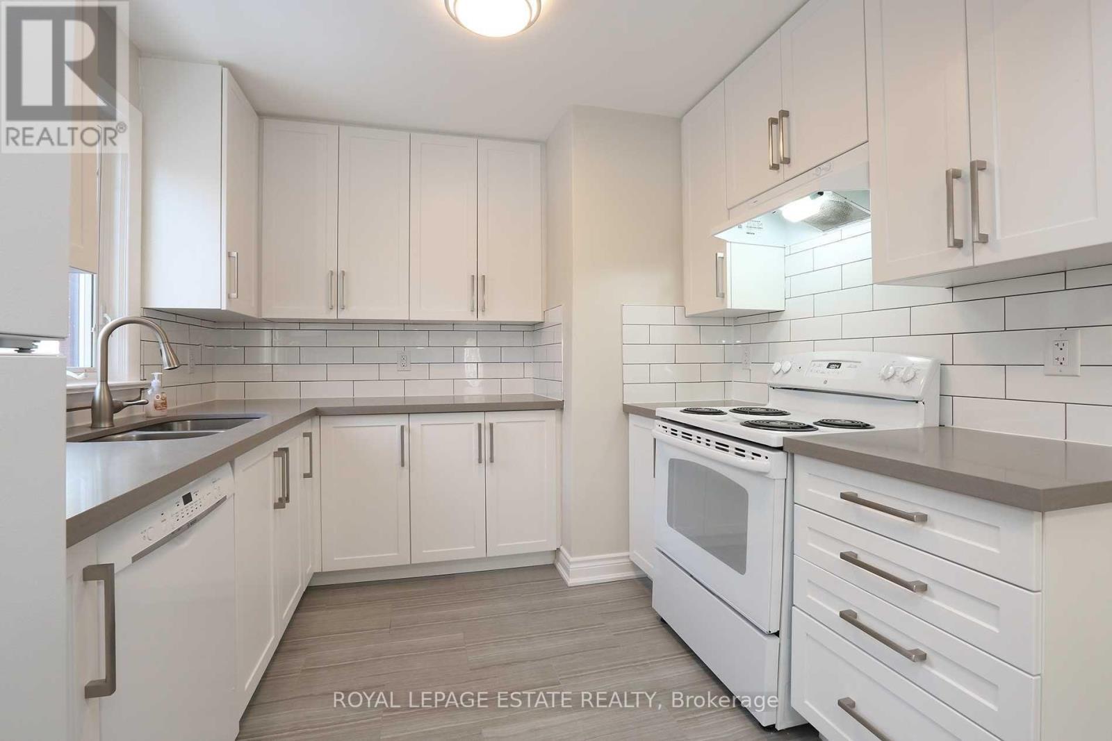 215 Oakridge Drive, Toronto, ON - Indoor Photo Showing Kitchen With Double Sink