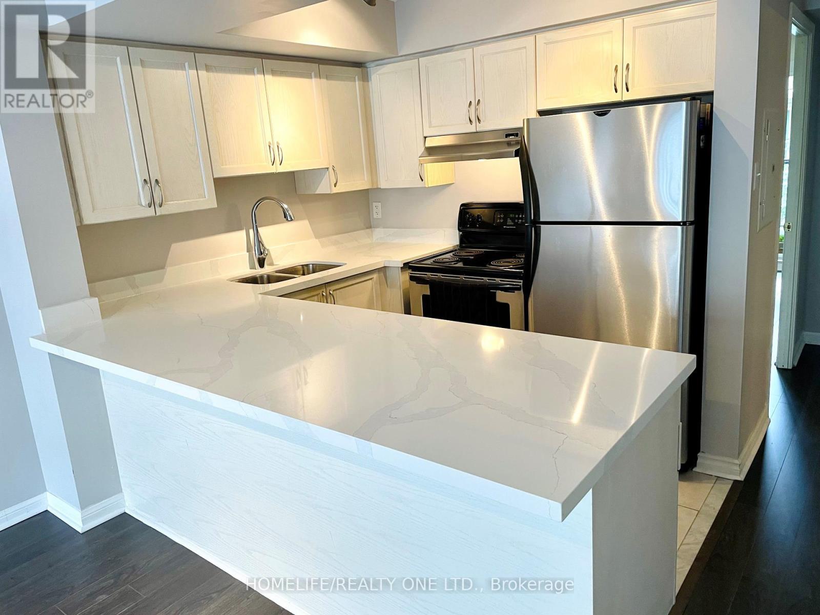 2084 - 65 George Appleton Way, Toronto, ON - Indoor Photo Showing Kitchen With Double Sink