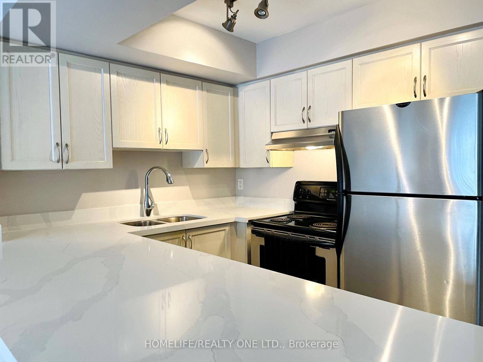 2084 - 65 George Appleton Way, Toronto, ON - Indoor Photo Showing Kitchen With Double Sink