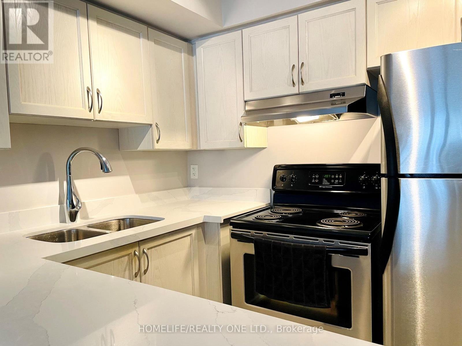 2084 - 65 George Appleton Way, Toronto, ON - Indoor Photo Showing Kitchen With Double Sink