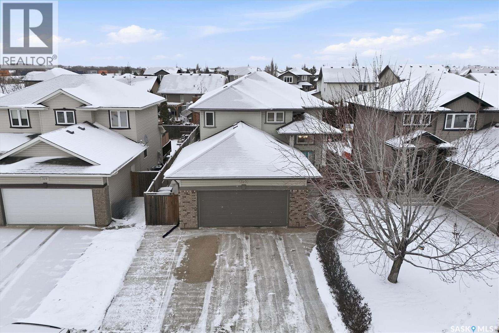 323 Hettle Cove, Saskatoon, SK - Outdoor With Facade