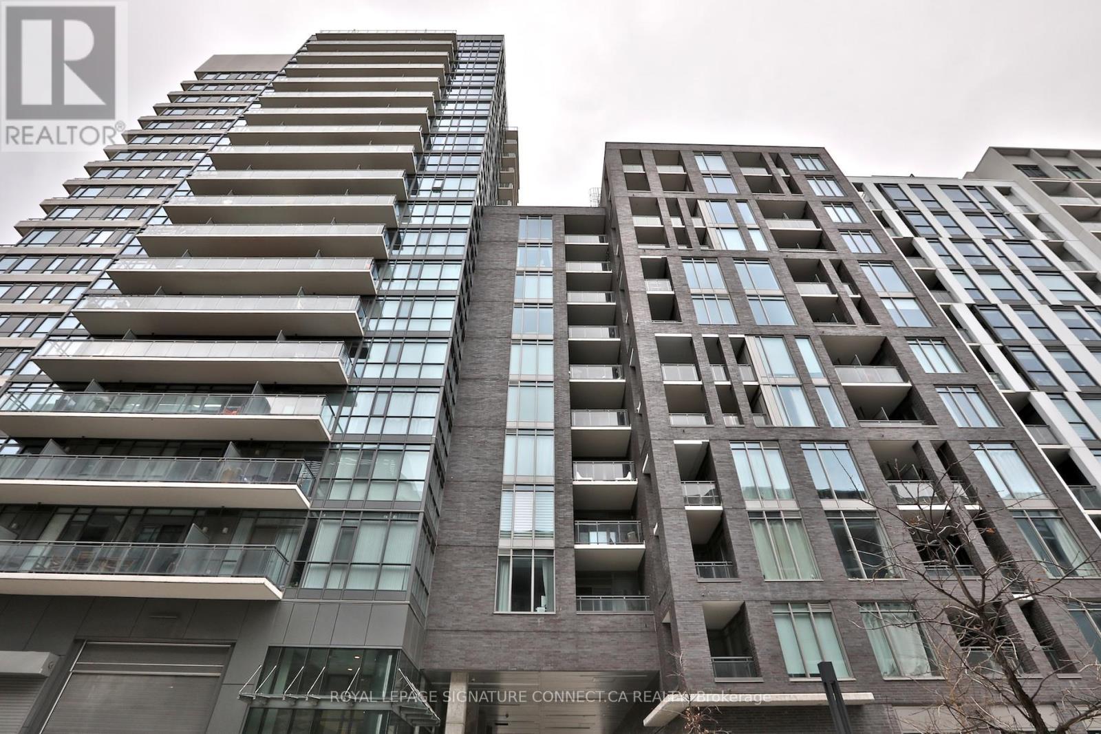 830 - 20 Minowan Miikan Lane, Toronto, ON - Outdoor With Balcony With Facade