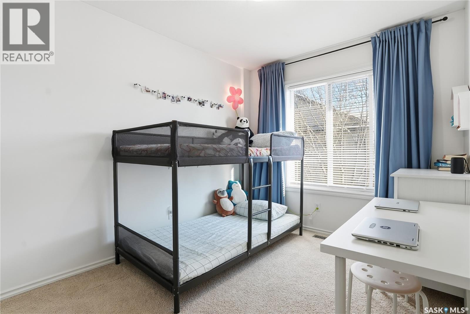 120 303 Slimmon Place, Saskatoon, SK - Indoor Photo Showing Bedroom