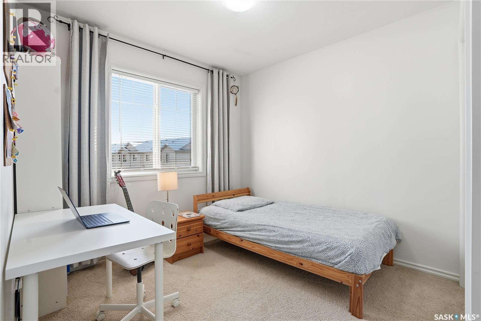 120 303 Slimmon Place, Saskatoon, SK - Indoor Photo Showing Bedroom