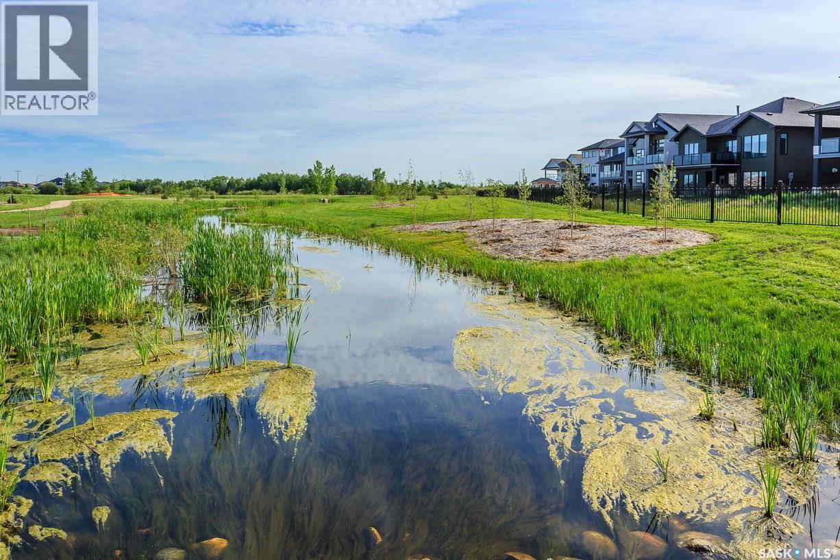 120 303 Slimmon Place, Saskatoon, SK - Outdoor With Body Of Water With View
