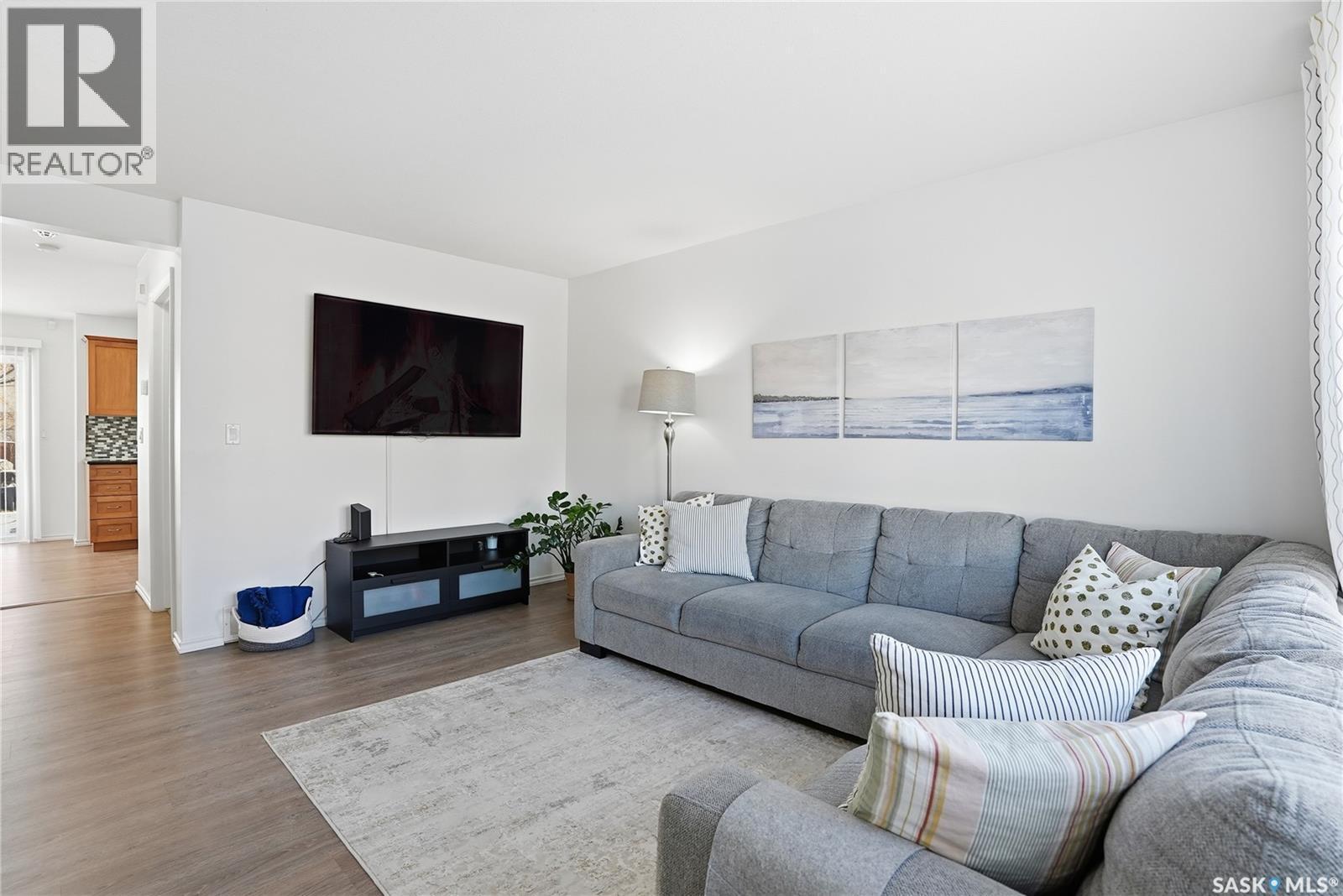 120 303 Slimmon Place, Saskatoon, SK - Indoor Photo Showing Living Room