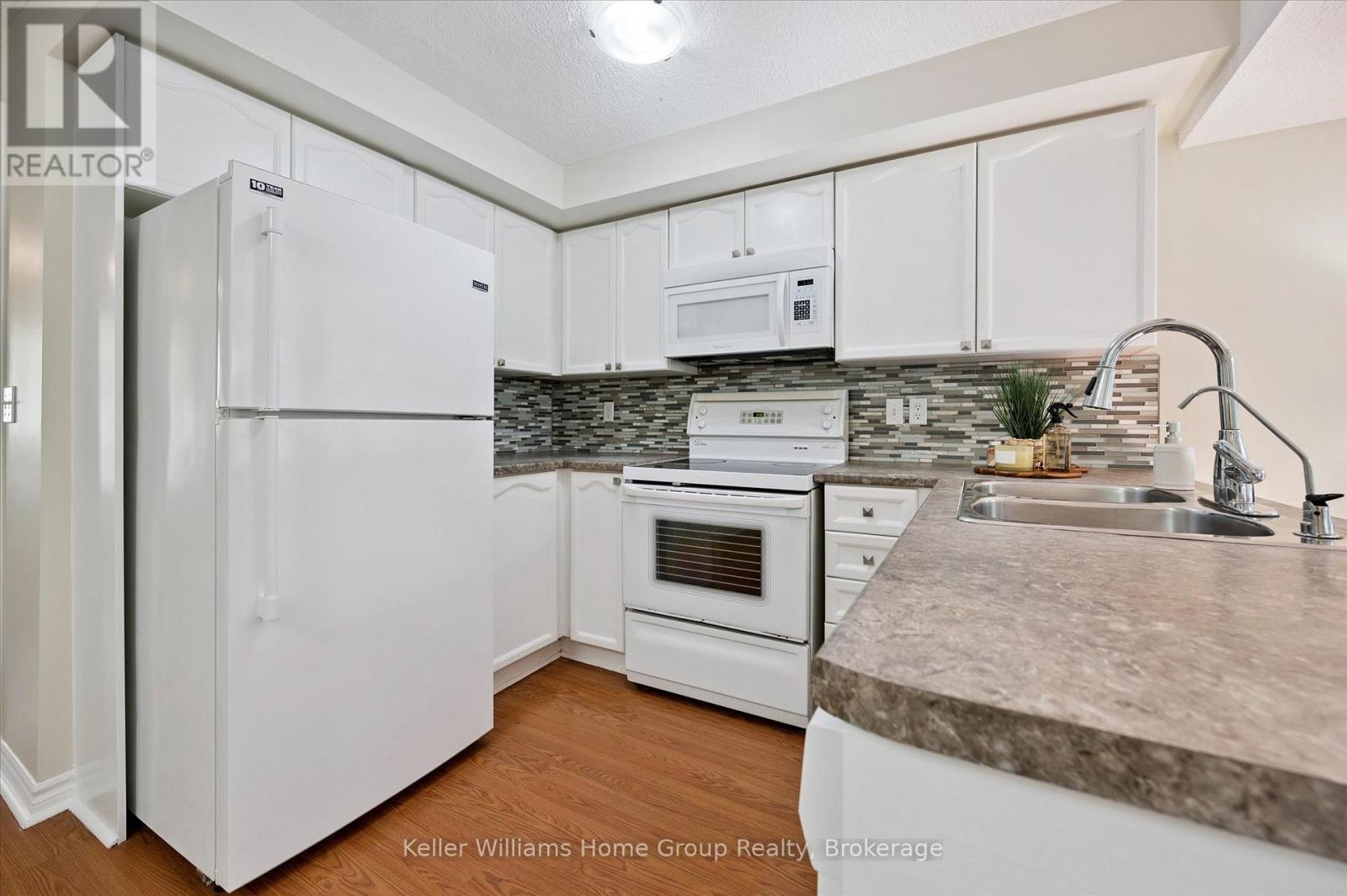 97 Rodgers Road, Guelph (Kortright West), ON - Indoor Photo Showing Kitchen With Double Sink