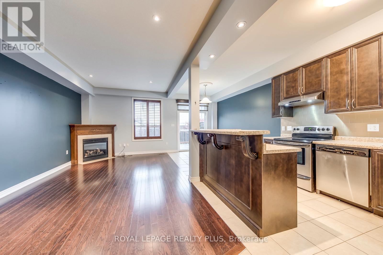 14 Marina Point Crescent, Hamilton, ON - Indoor Photo Showing Kitchen With Fireplace