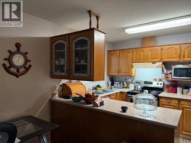 6840 89Th Street Unit# 314, Osoyoos, BC - Indoor Photo Showing Kitchen With Double Sink