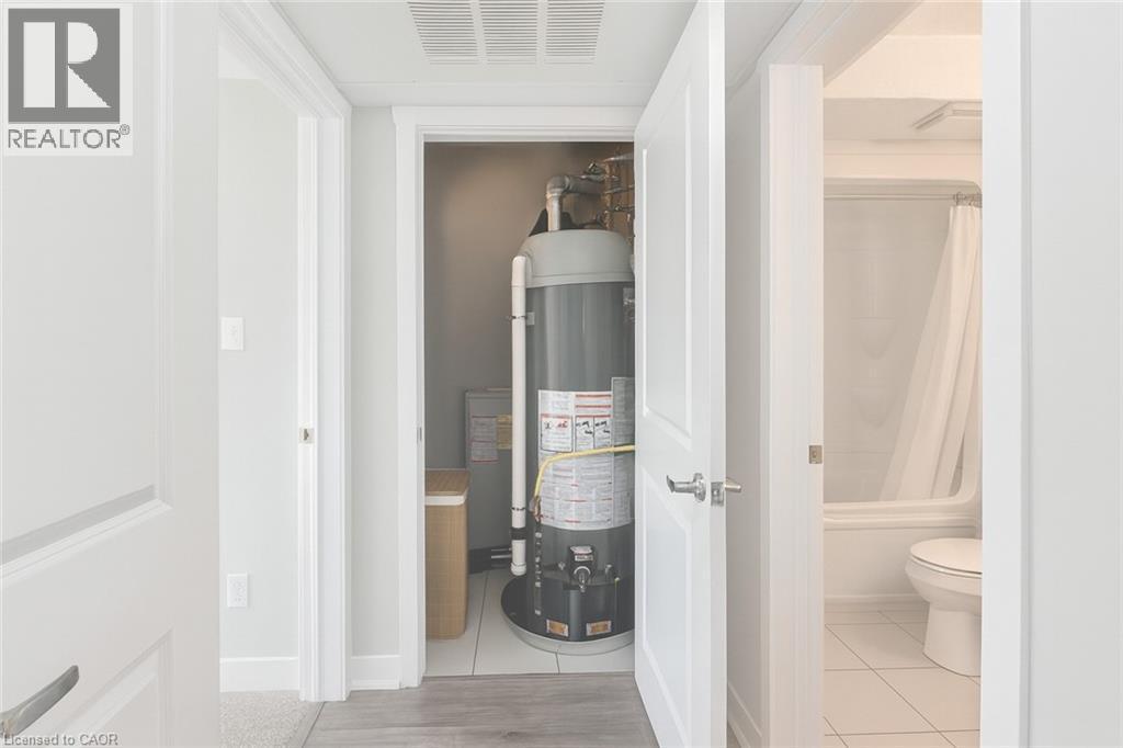 Utility room with gas water heater - 185 Windale Crescent Unit# 5A, Kitchener, ON - Indoor