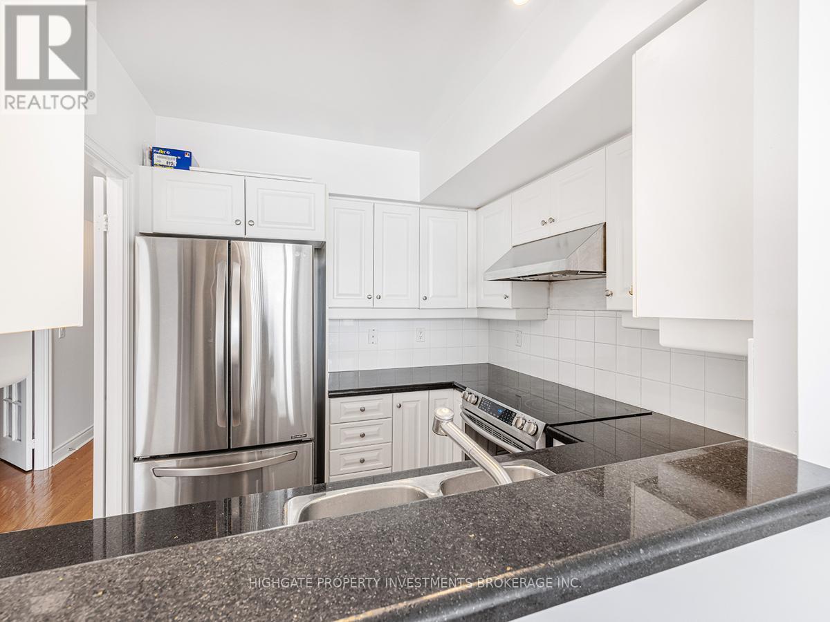 719 - 10 Delisle Avenue, Toronto, ON - Indoor Photo Showing Kitchen With Stainless Steel Kitchen With Double Sink