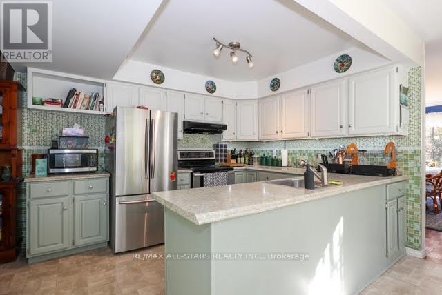 506 Snug Harbour Road, Kawartha Lakes (Lindsay), ON - Indoor Photo Showing Kitchen