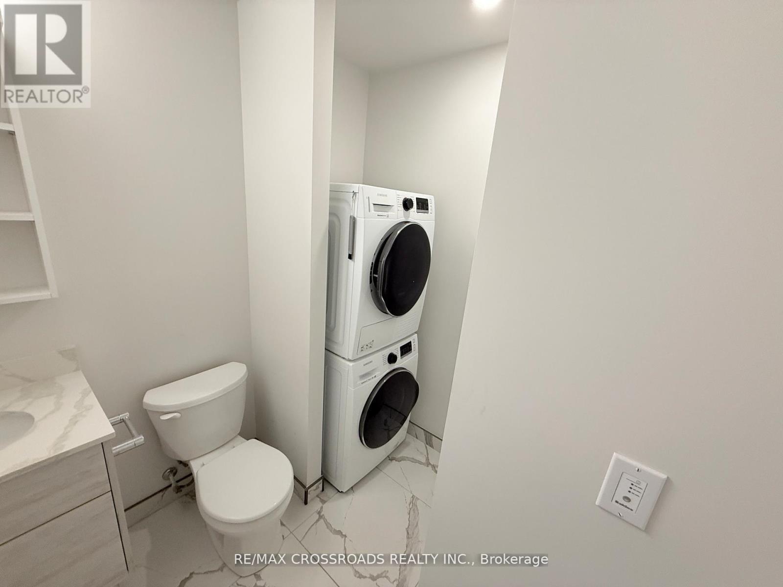 810 - 60 Frederick Street, Kitchener, ON - Indoor Photo Showing Laundry Room