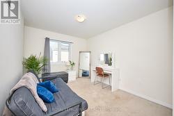 The 3rd bedroom. All 3 are carpeted. -