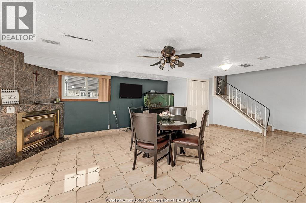10615 Keating Crescent, Windsor, ON - Indoor With Fireplace