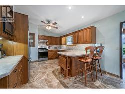 Gas stove and eat up bar add to this functional space! -