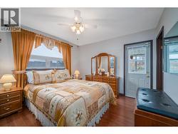 Primary bedroom with access to the back covered deck! -