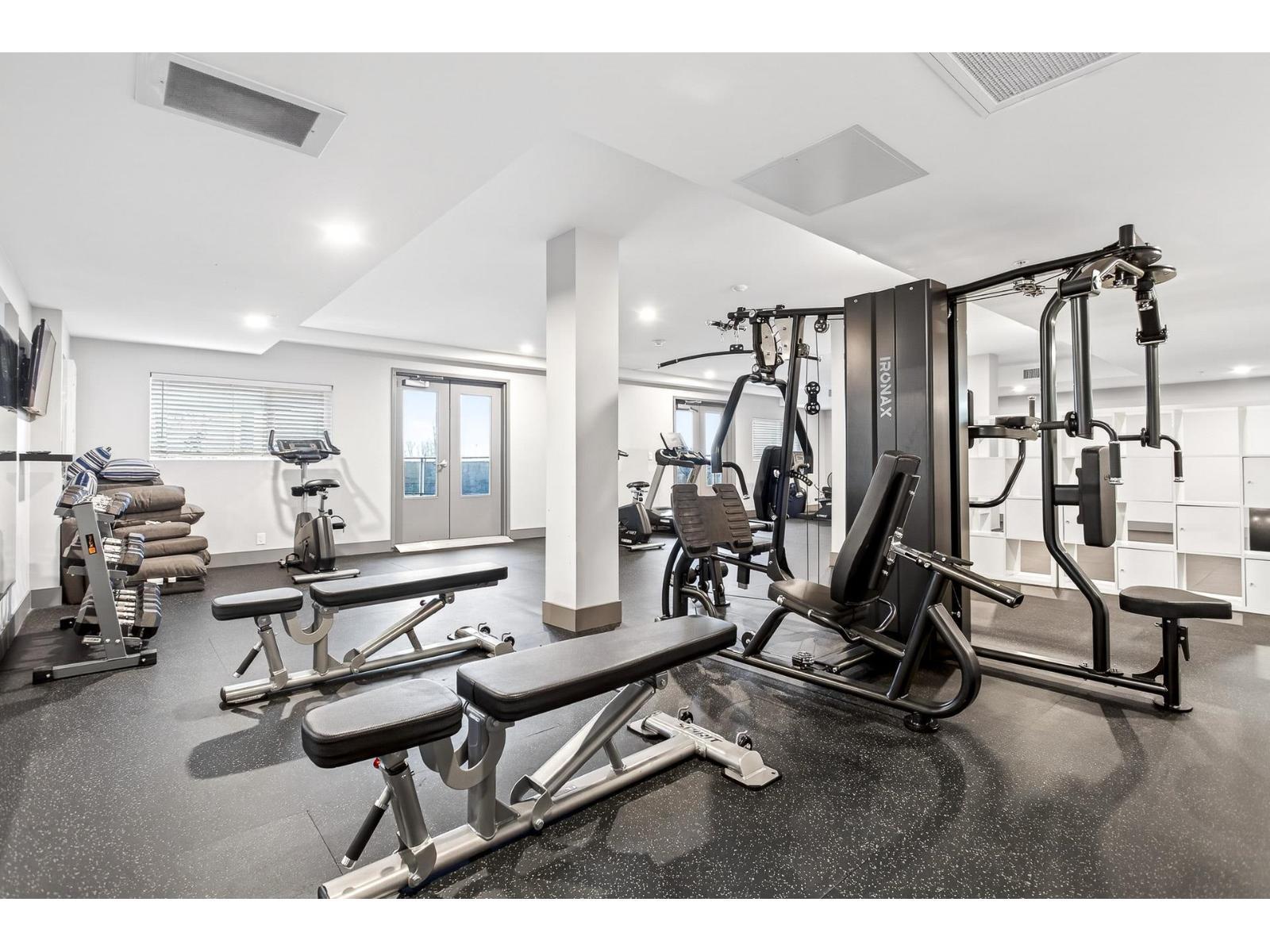 214 20061 Fraser Highway, Langley, BC - Indoor Photo Showing Gym Room