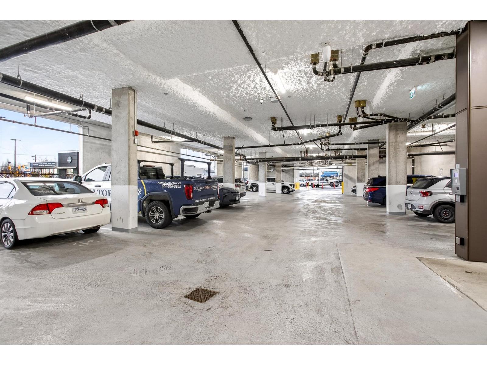 214 20061 Fraser Highway, Langley, BC - Indoor Photo Showing Garage