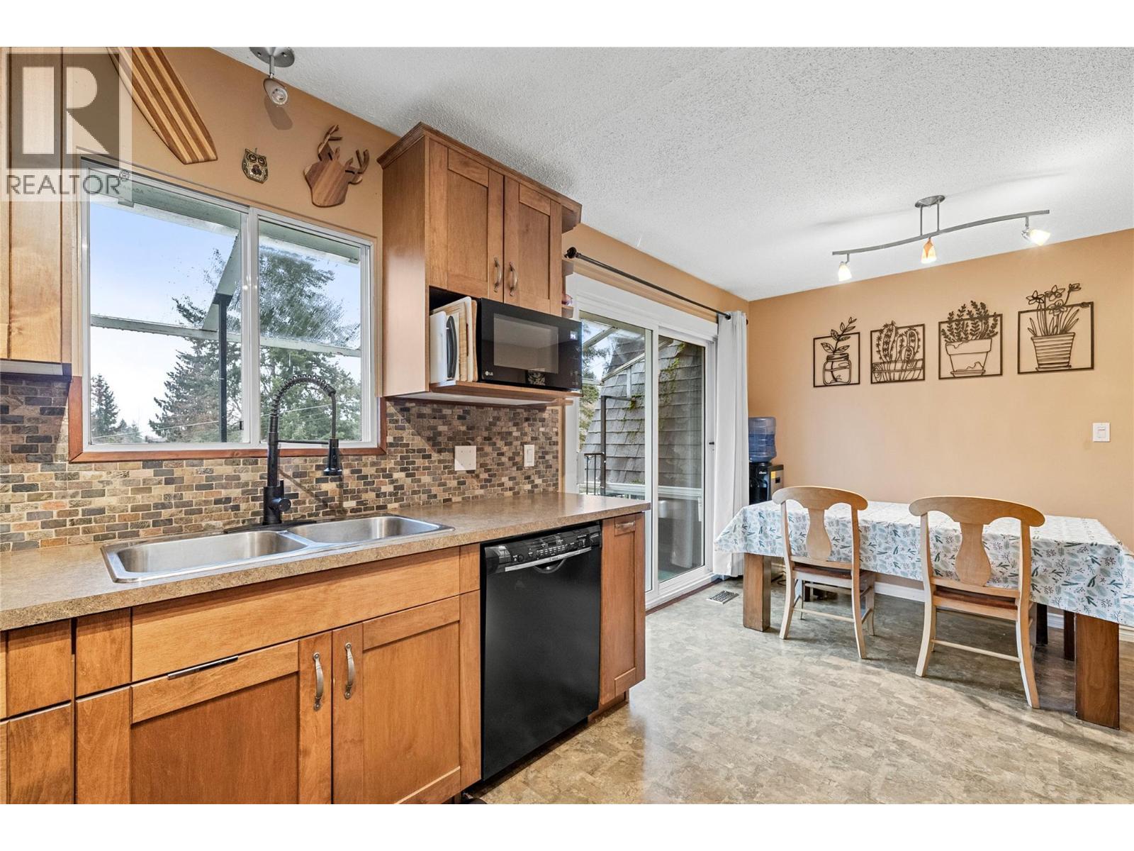 2150 1 Avenue Ne, Salmon Arm, BC - Indoor Photo Showing Kitchen With Double Sink