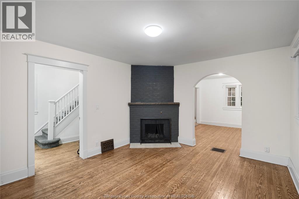 1752 Oneida, Windsor, ON - Indoor Photo Showing Living Room With Fireplace
