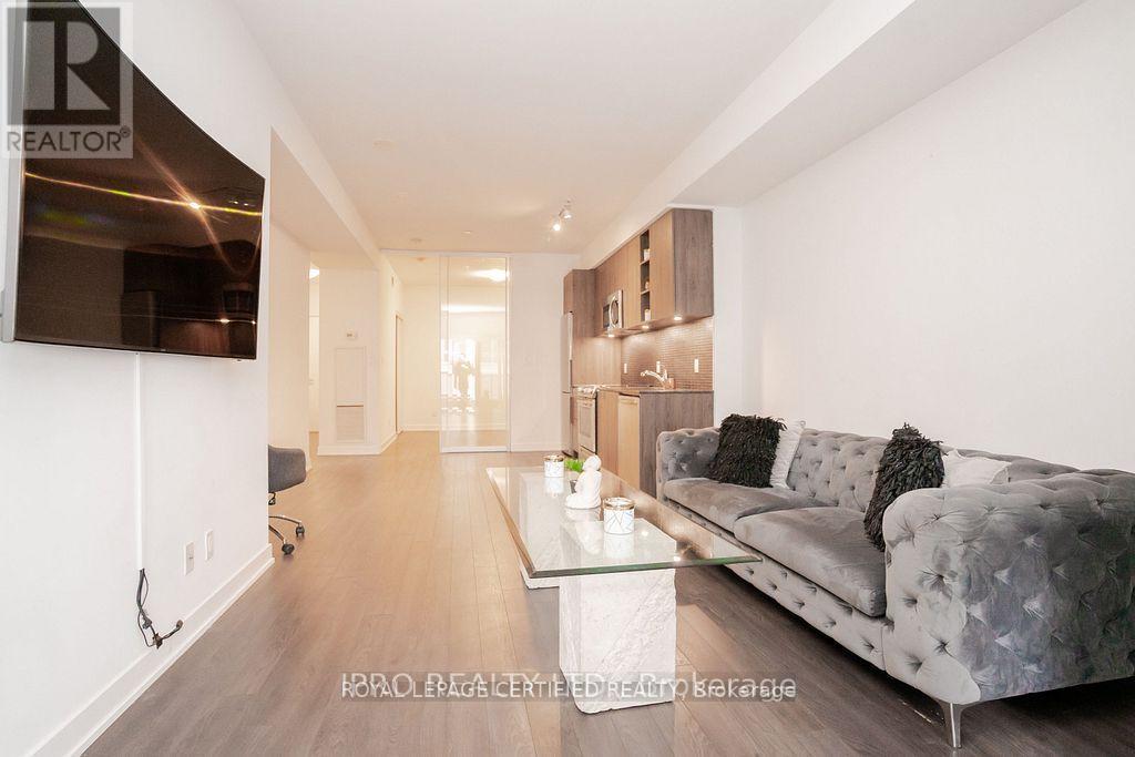 407 - 30 Ordnance Street, Toronto, ON - Indoor Photo Showing Living Room
