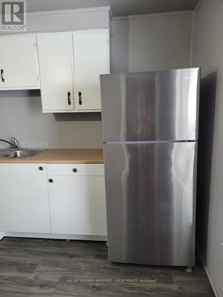1004 Brock Road, Frontenac, ON - Indoor Photo Showing Kitchen With Double Sink