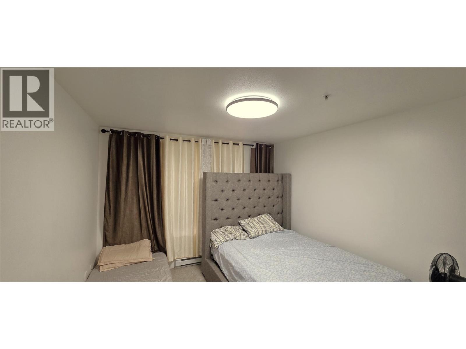 256 Hastings Avenue Unit# 206, Penticton, BC - Indoor Photo Showing Bedroom