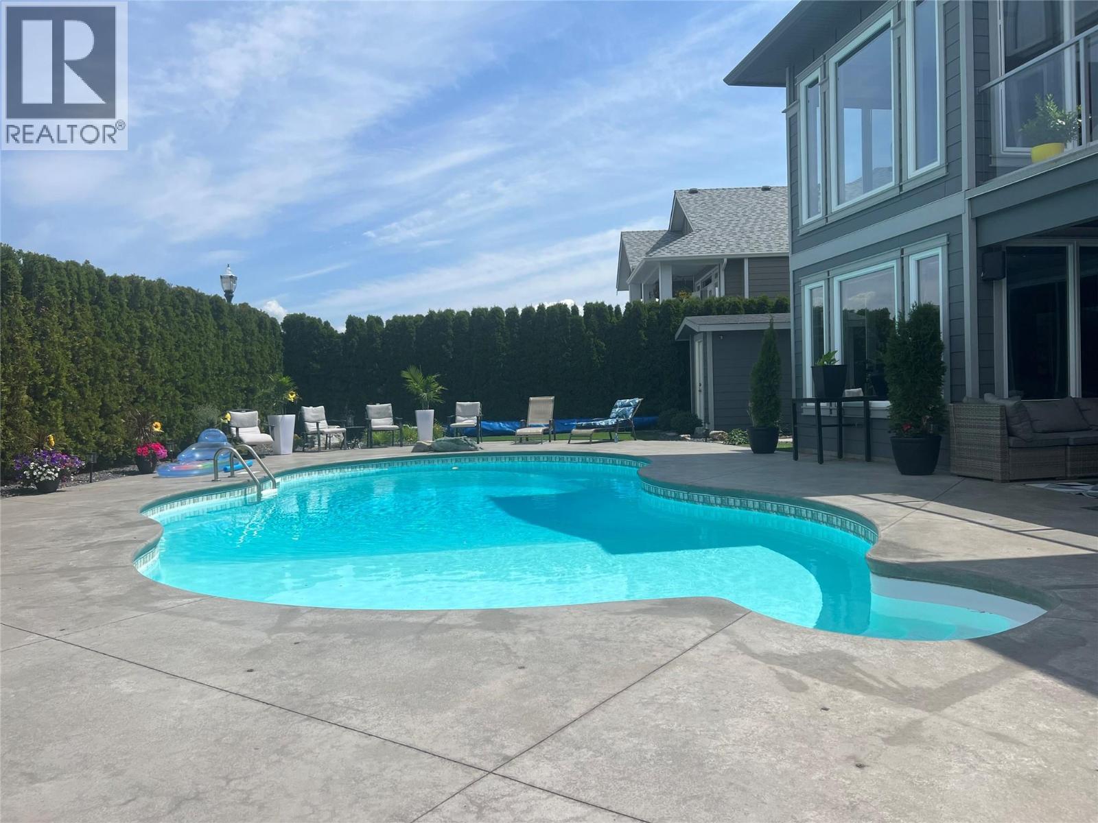 440 Audubon Court, Kelowna, BC - Outdoor With In Ground Pool