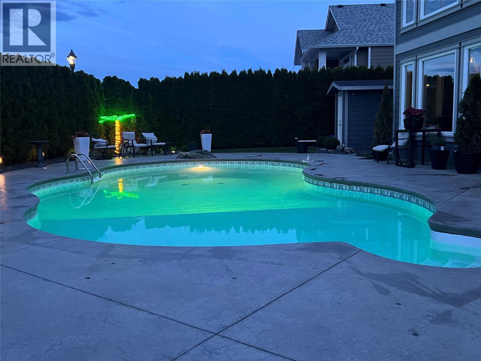 440 Audubon Court, Kelowna, BC - Outdoor With In Ground Pool