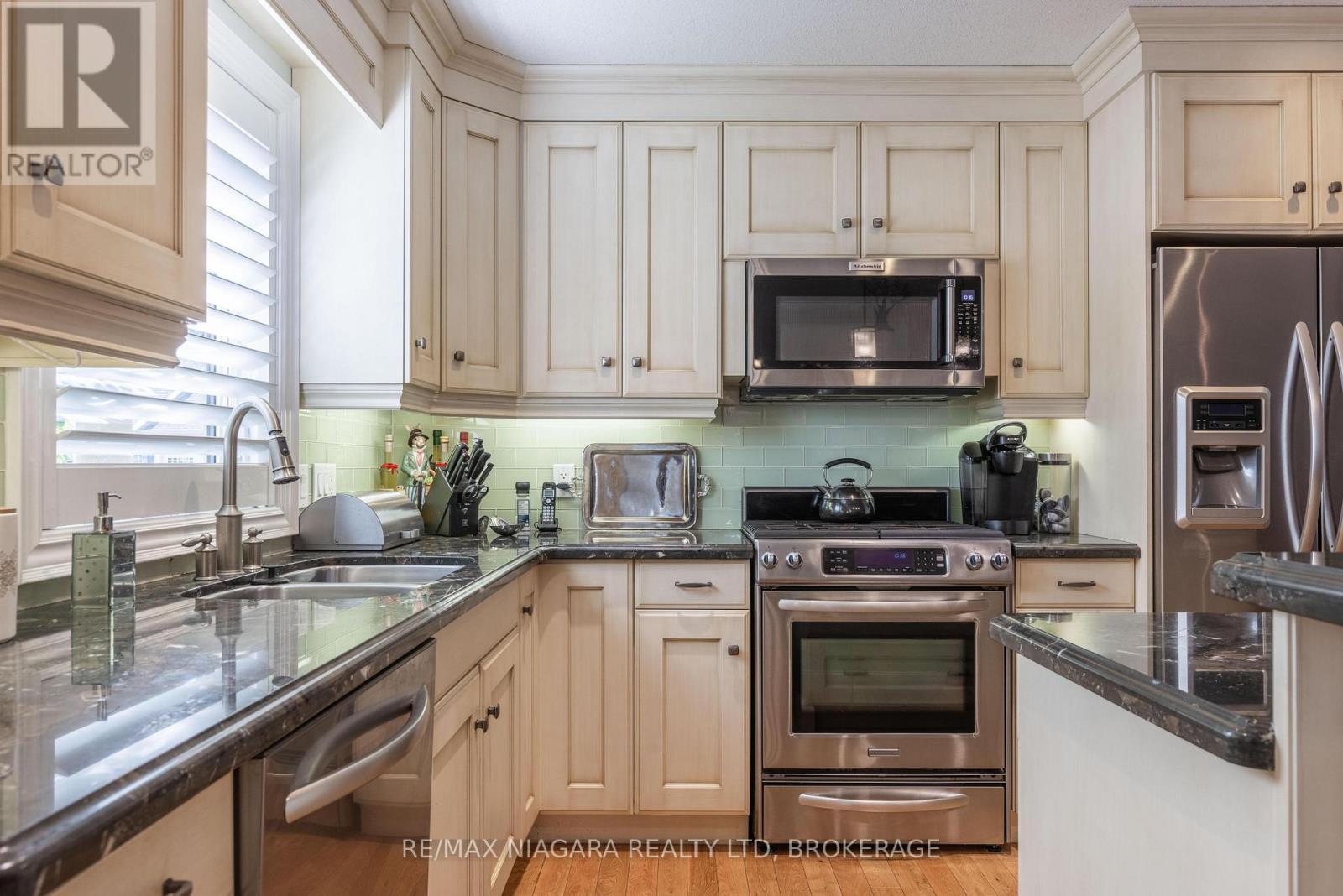 Main Level - Kitchen - 19 - 310 Ridge Road S, Fort Erie (Ridgeway), ON - Indoor Photo Showing Kitchen With Stainless Steel Kitchen With Double Sink