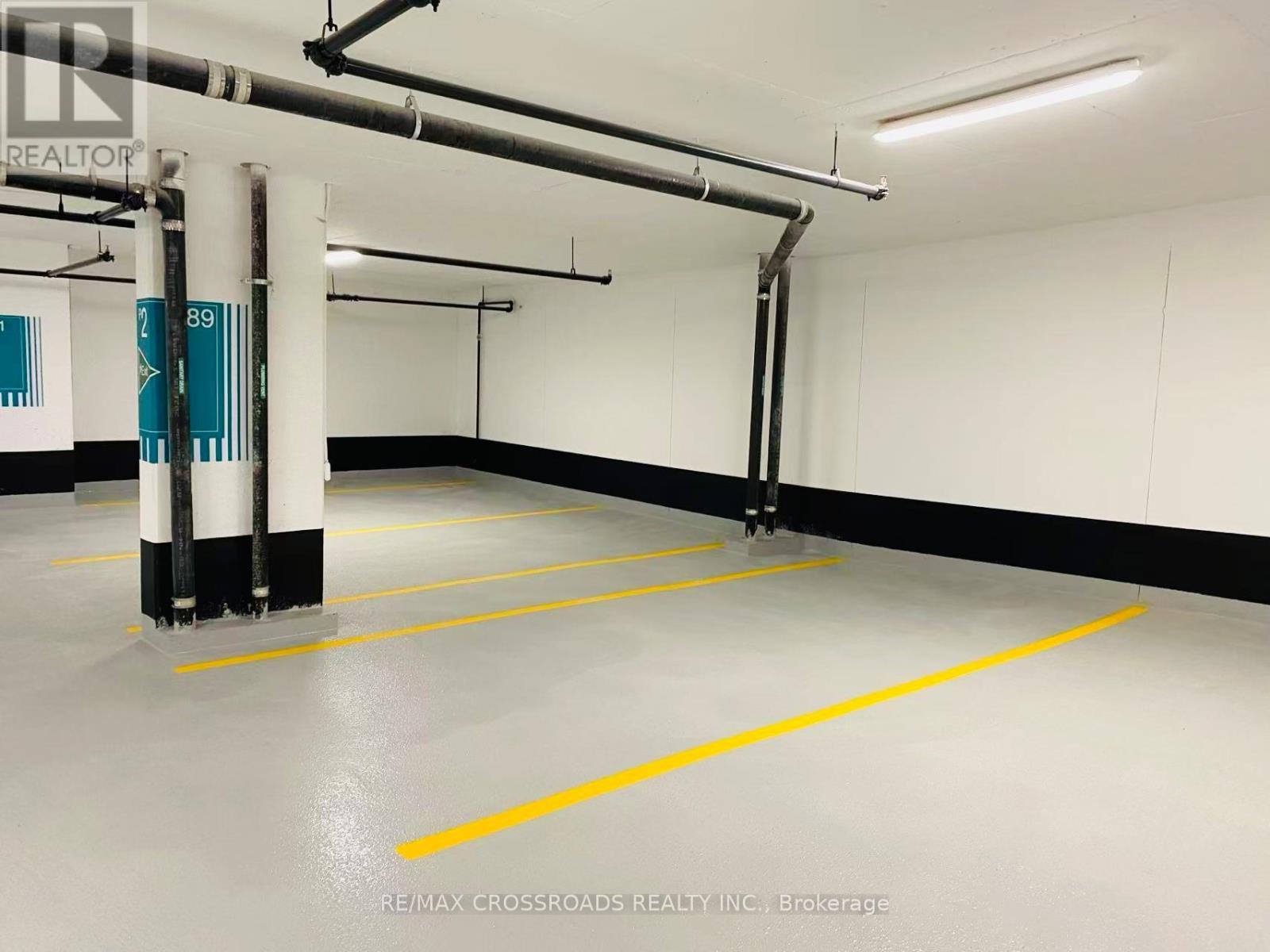 802 - 10 Eva Road, Toronto, ON - Indoor Photo Showing Garage