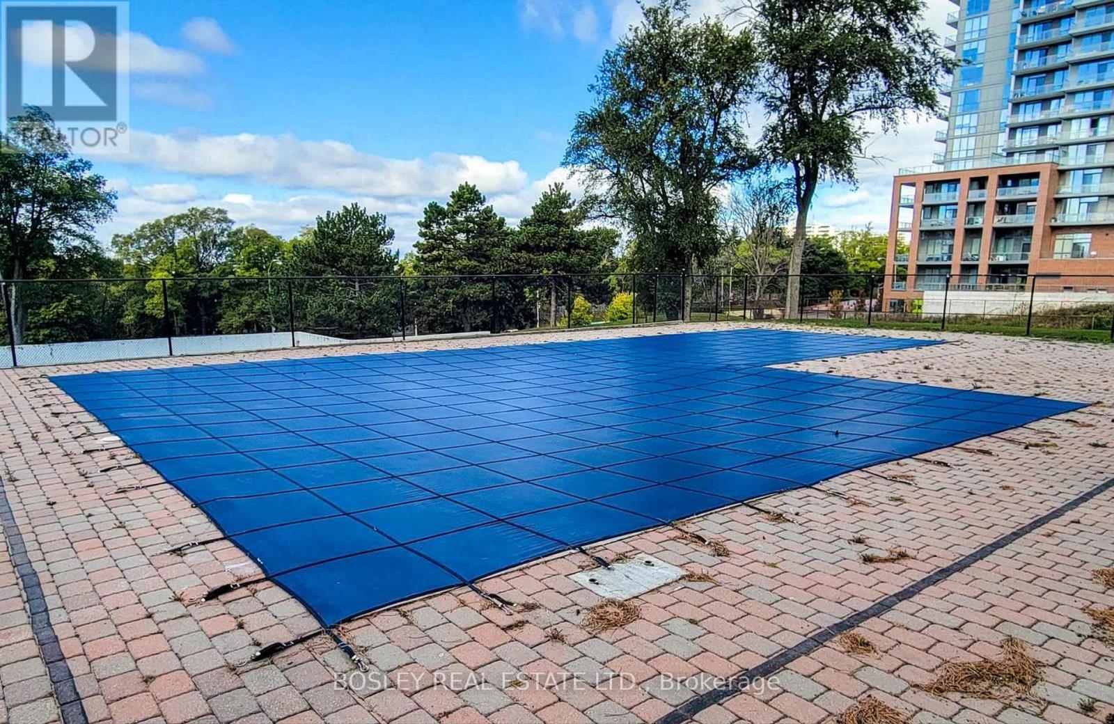 111 - 10 Parkway Forest Drive, Toronto, ON - Outdoor With In Ground Pool