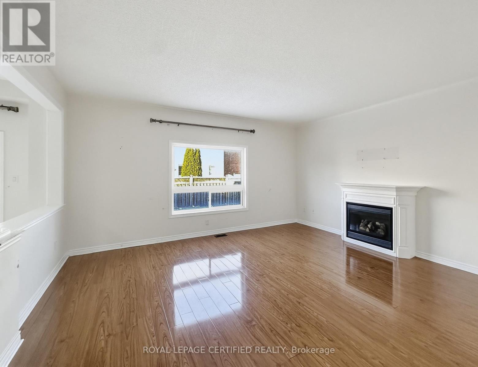 45 Alice Springs Crescent, Brampton, ON - Indoor Photo Showing Living Room With Fireplace