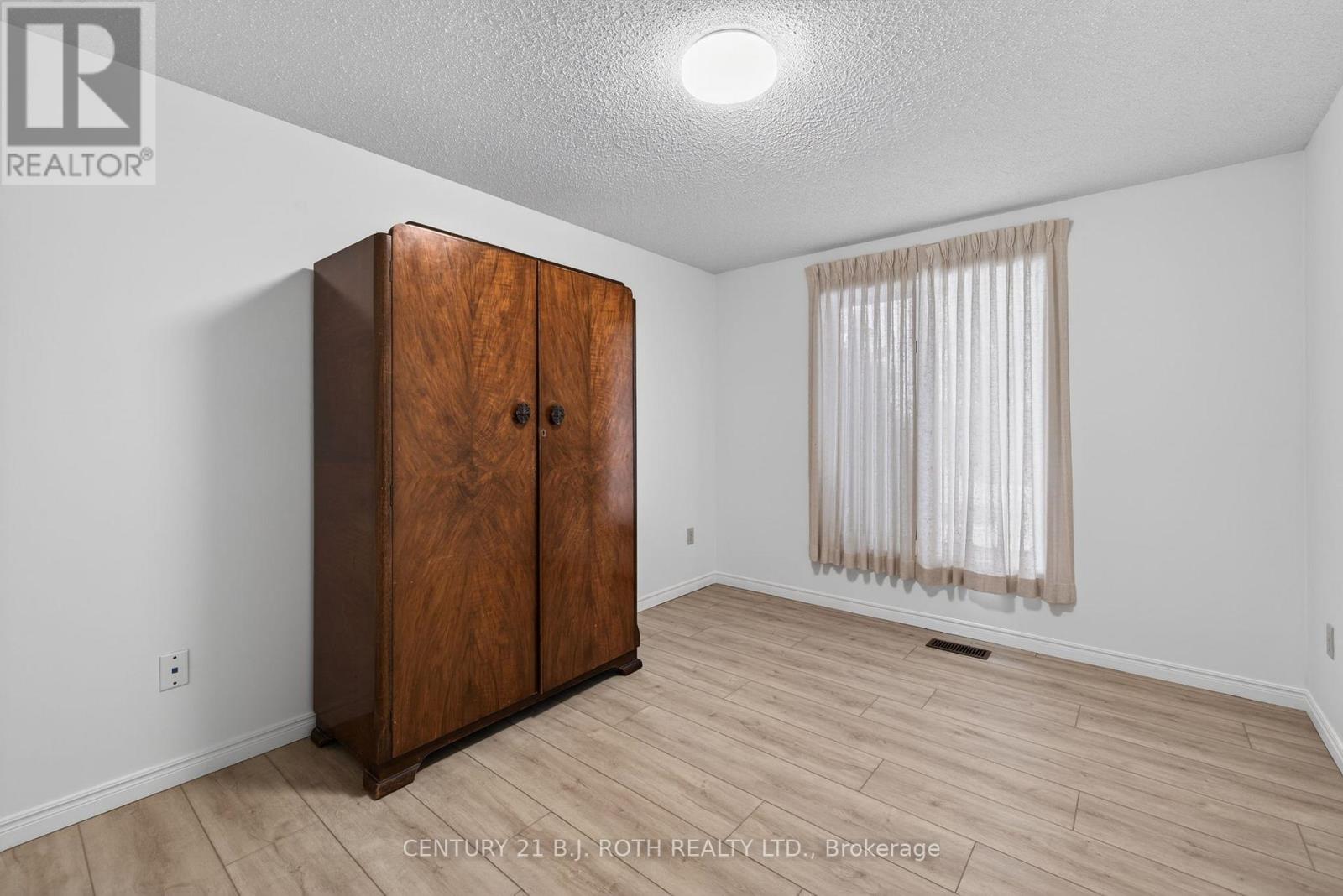 87 Tecumseth Pines Drive, New Tecumseth, ON - Indoor Photo Showing Other Room