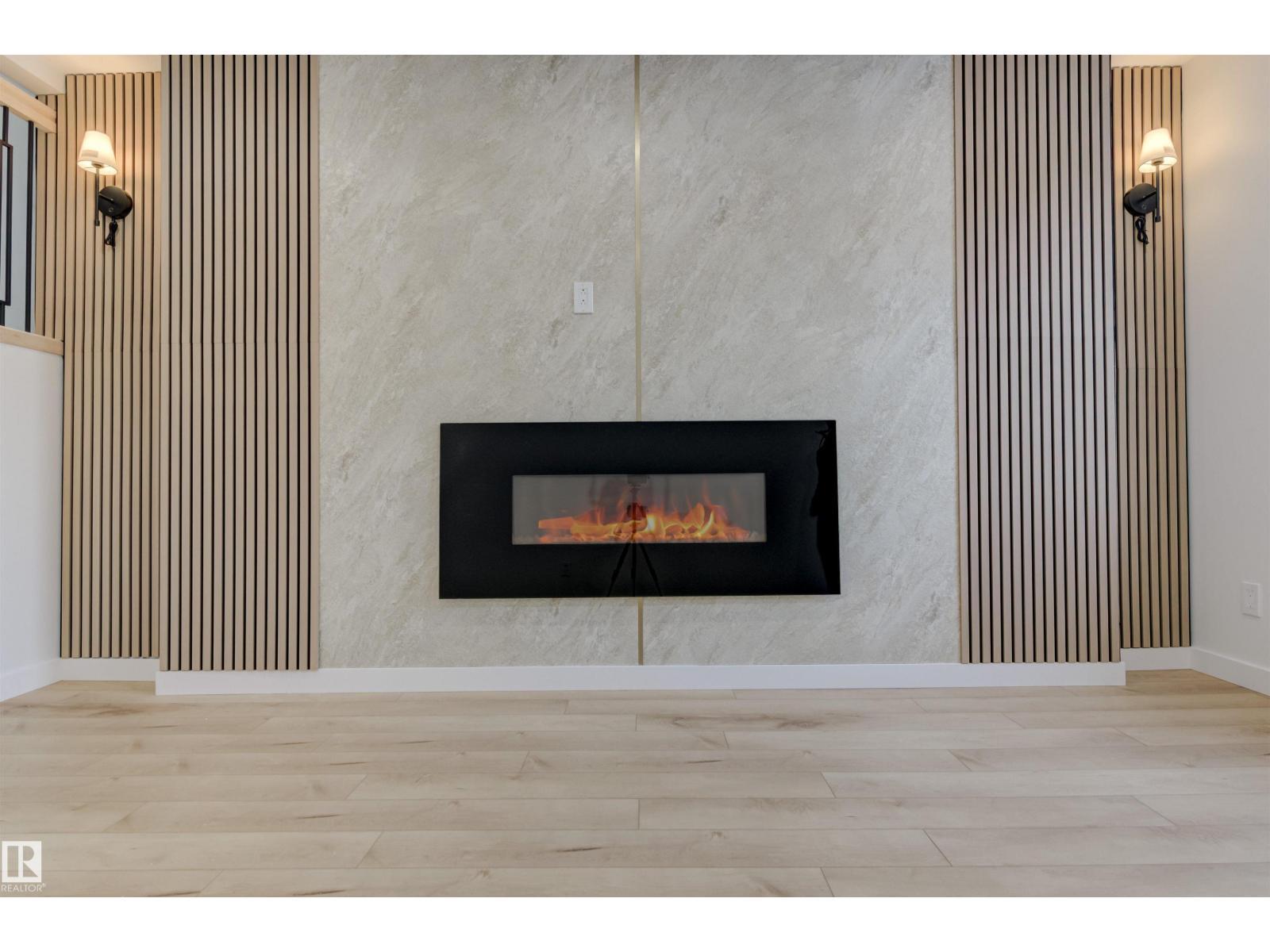 123 Morin Maze Mz Nw, Edmonton, AB - Indoor Photo Showing Living Room With Fireplace