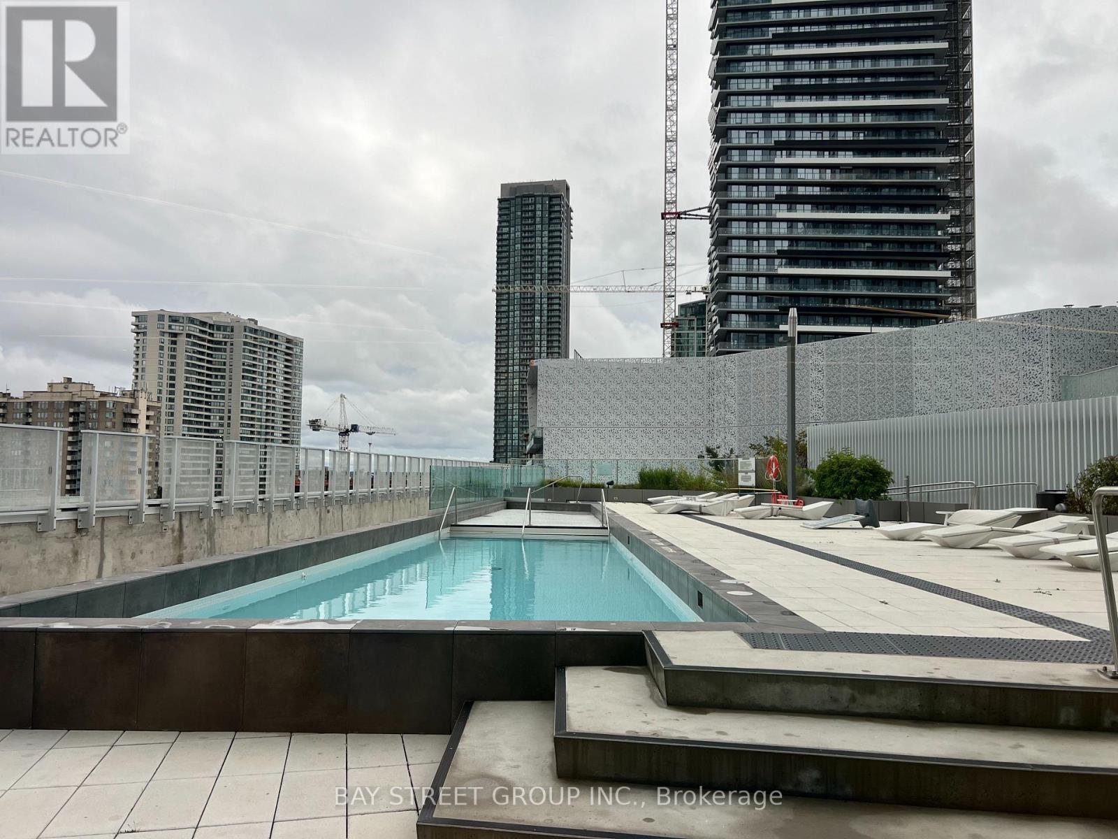 5207 - 3900 Confederation Parkway, Mississauga, ON - Outdoor With In Ground Pool