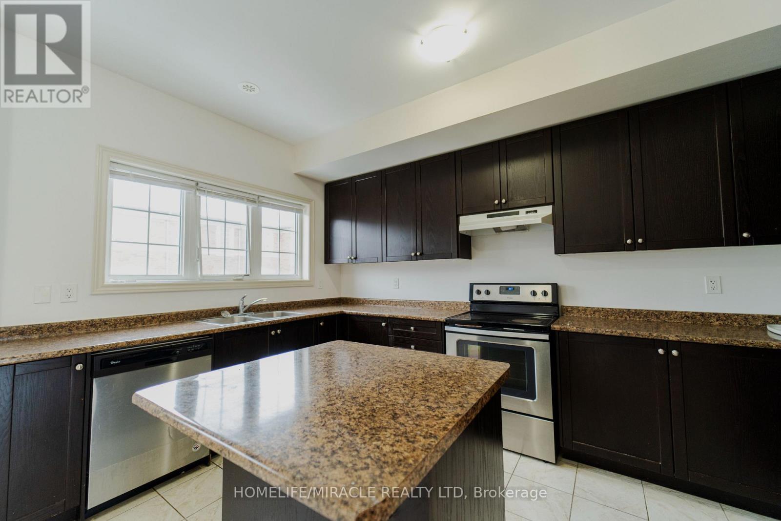 106 Aspen Hills Road, Brampton, ON - Indoor Photo Showing Kitchen With Stainless Steel Kitchen With Double Sink