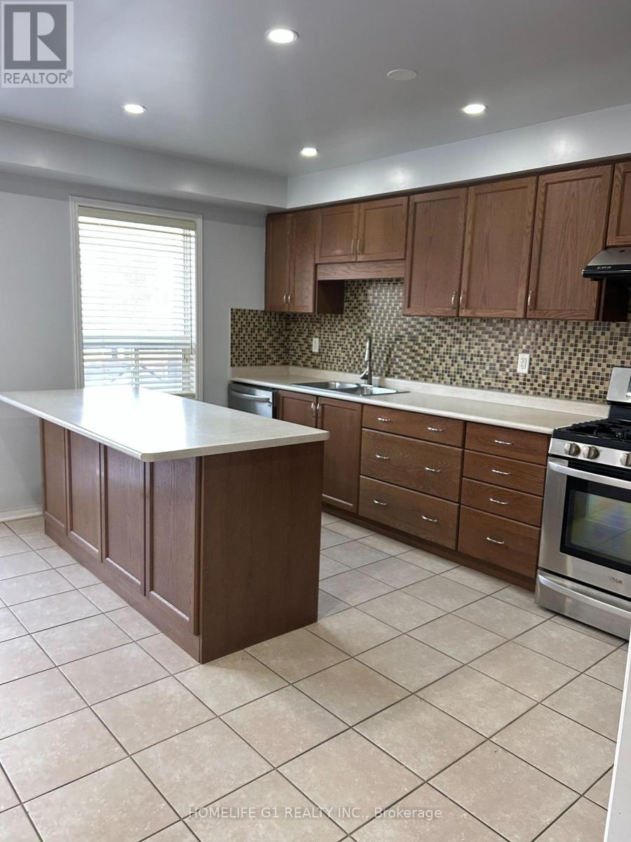 86 Newington Crescent, Brampton, ON - Indoor Photo Showing Kitchen With Double Sink