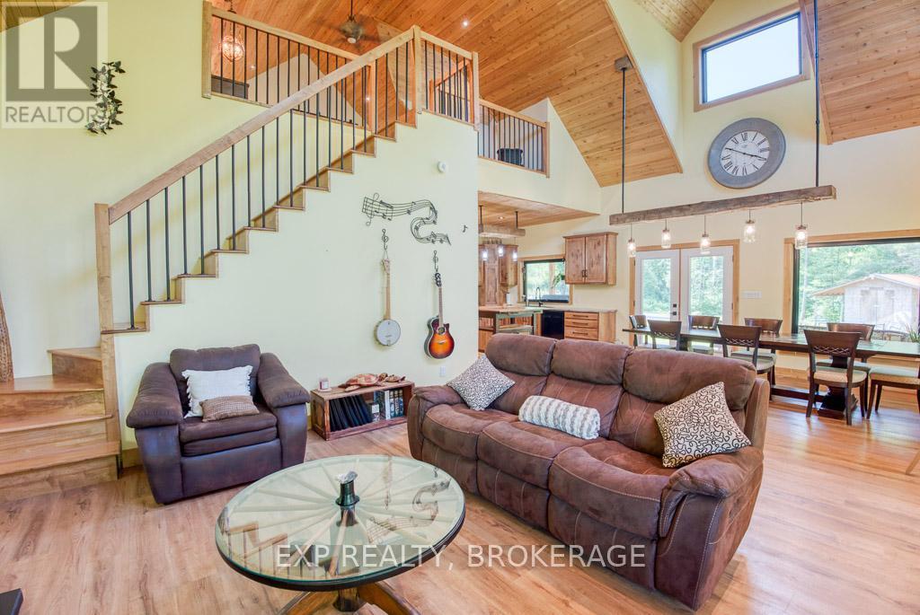 1249 Waters Edge Lane, Frontenac (Frontenac Centre), ON - Indoor Photo Showing Living Room
