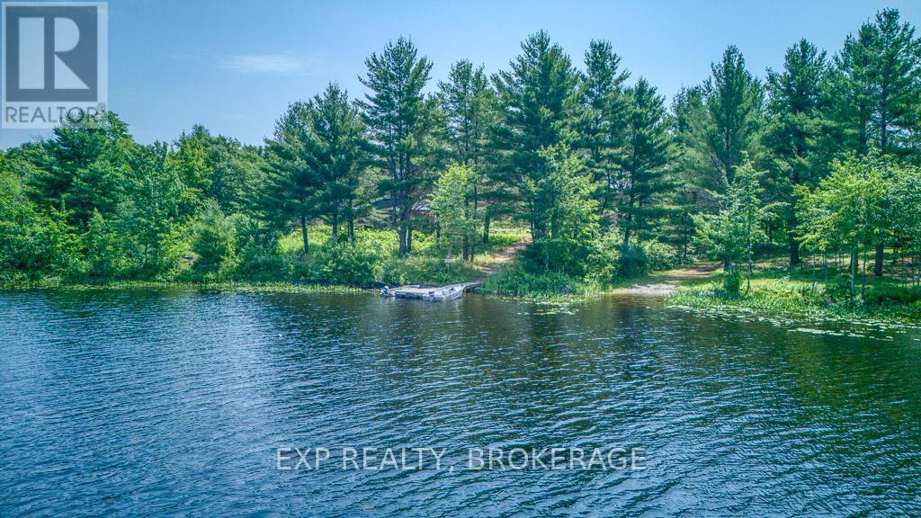 1249 Waters Edge Lane, Frontenac (Frontenac Centre), ON - Outdoor With Body Of Water