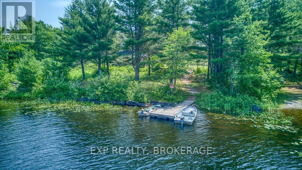 1249 Waters Edge Lane, Frontenac (Frontenac Centre), ON - Outdoor With Body Of Water