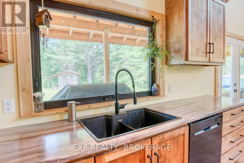 1249 Waters Edge Lane, Frontenac (Frontenac Centre), ON - Indoor Photo Showing Kitchen With Double Sink